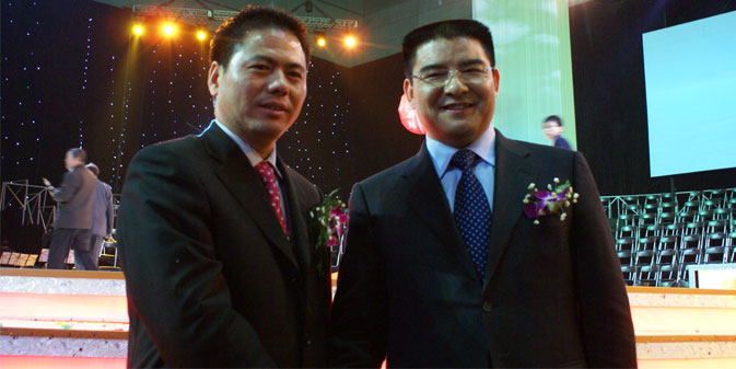 蒋锡培与江苏黄埔再生资源利用有限公司董事长陈光标合影